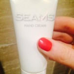 Ashley Moore's hand on SEAMS Hand Cream
